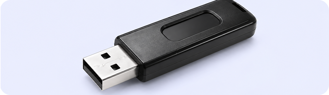 A USB drive used to transfer videos manually